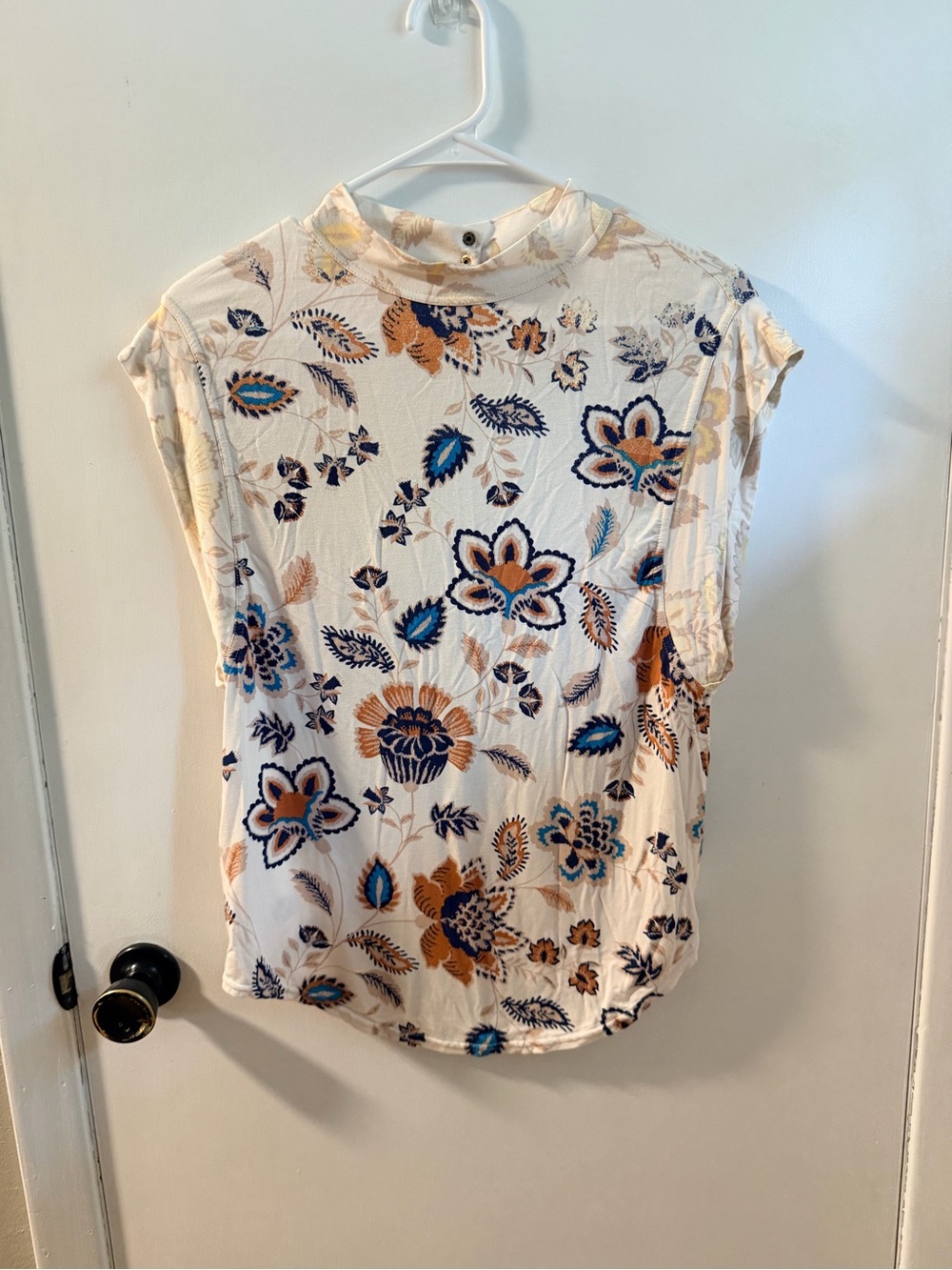 Free People Floral Mock-Neck Sleeveless Top in Cream, Blue, and Tan